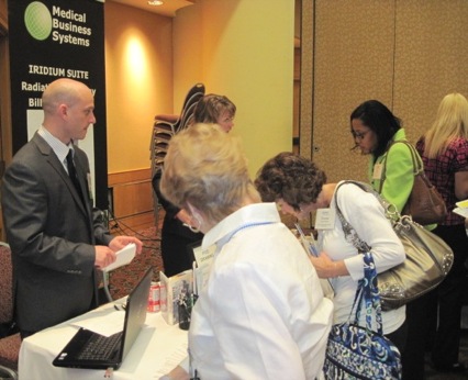 Jamie Giunta, Medical Business Systems, with attendees